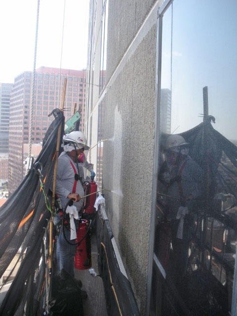 Custom mesh was installed to prevent overspray from landing on vehicles and pedestrians